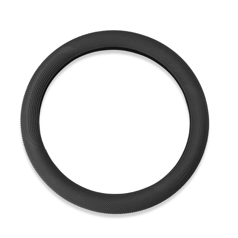 Black ribbed steering wheel cover on a white background